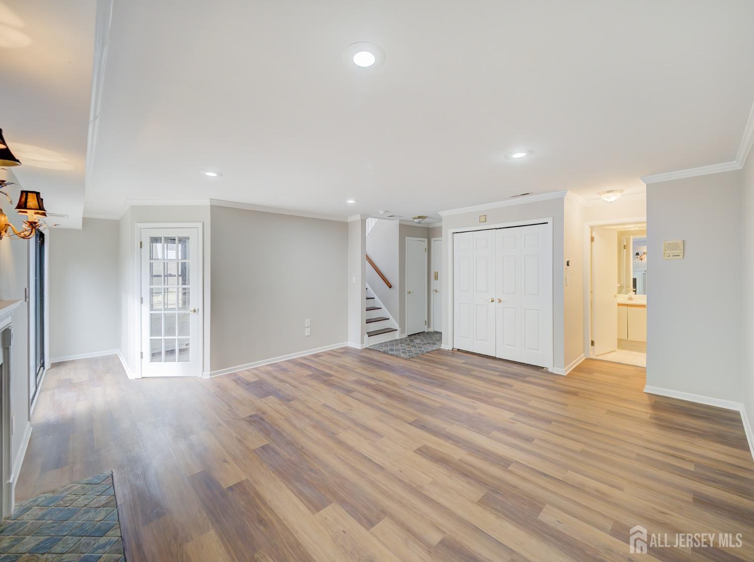 4905 Stonehedge Road Edison, NJ 08820 - Photo 16 of 43 a view of empty room with wooden floor