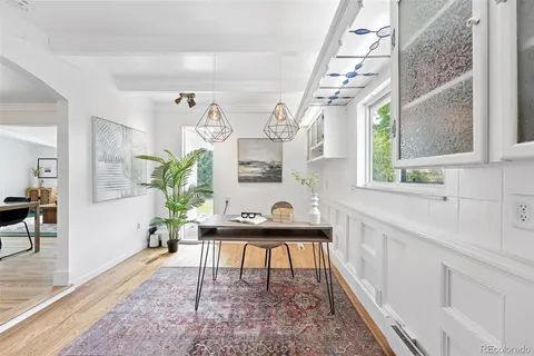 a view of a entryway with furniture and a potted plant