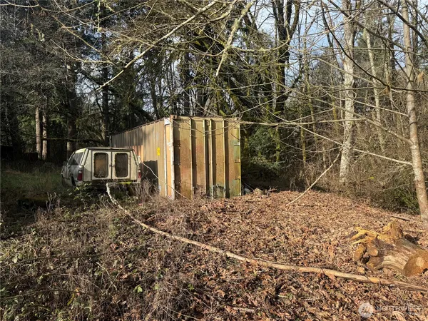 a backyard of a house with lots of green space