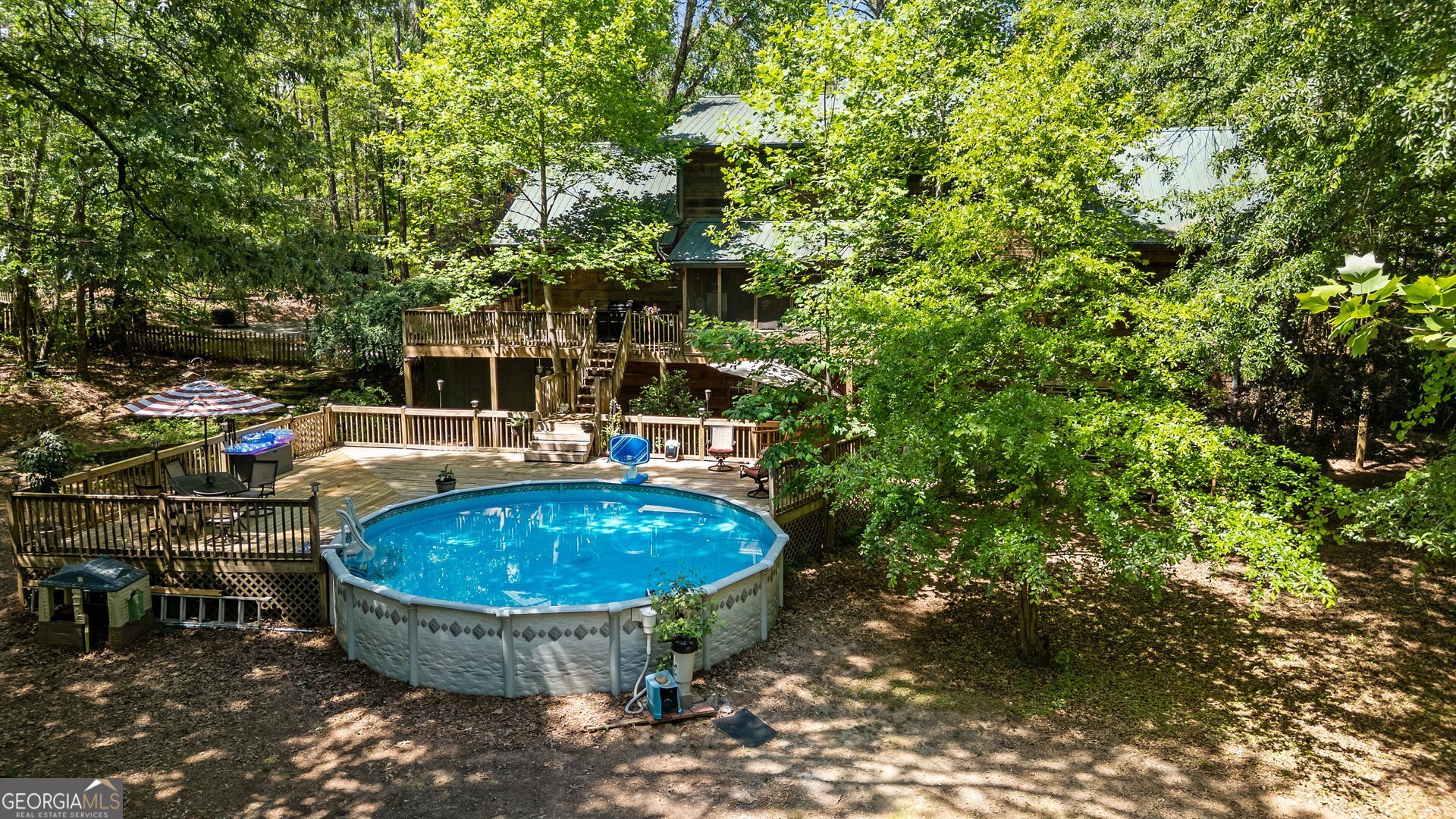 4930 Post Road Winston, GA 30187 - Photo 51 of 59 a view of a swimming pool with a yard and seating area