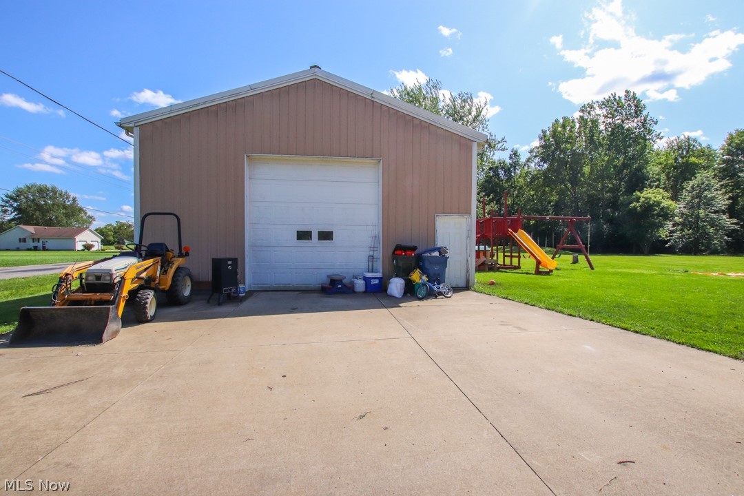 40015 Parsons Road Lagrange, OH 44050 - Photo 2 of 35 32 x 64 Outbuilding with 14 ft ceilings! Heated,water Extra Thick Pad 100 amp service!