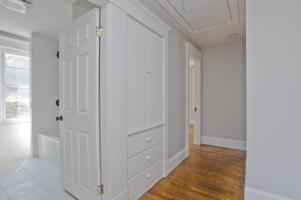 69 Merrimac Avenue Springfield, MA 01104 - Photo 25 of 42 a view of a room with wooden floor