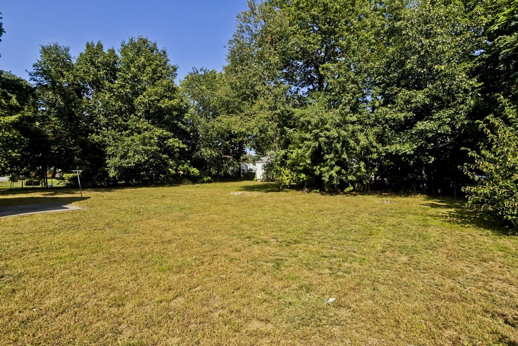 69 Merrimac Avenue Springfield, MA 01104 - Photo 31 of 42 a view of swimming pool with an outdoor space