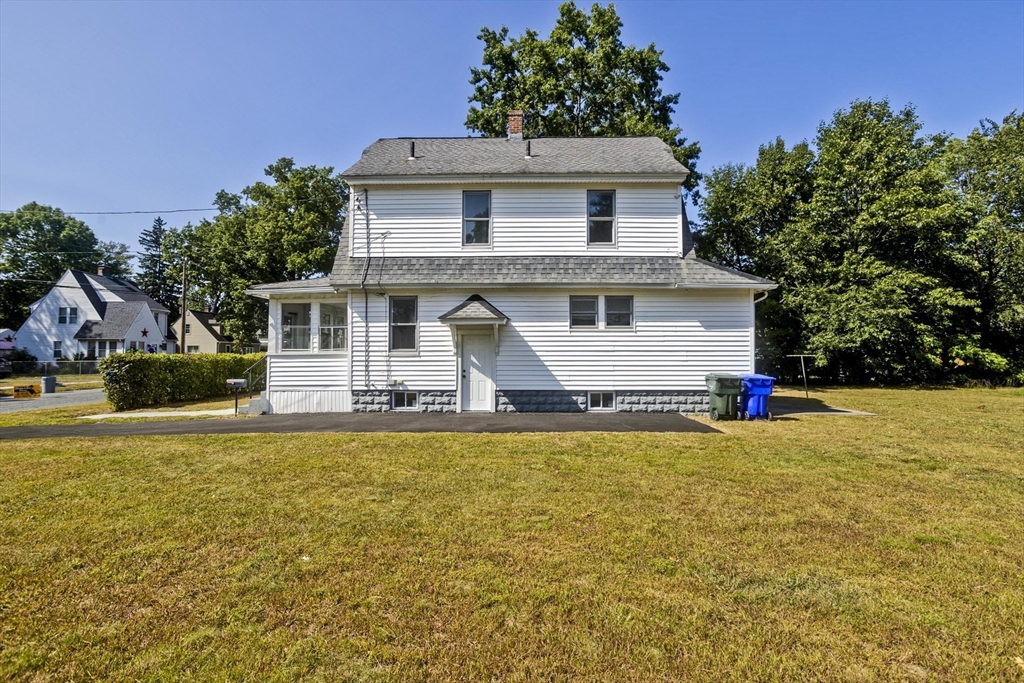 69 Merrimac Avenue Springfield, MA 01104 - Photo 34 of 42 a house view with swimming pool in front of it
