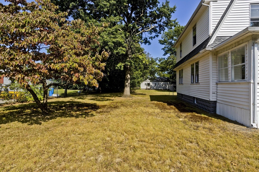 69 Merrimac Avenue Springfield, MA 01104 - Photo 38 of 42 a view of house with yard