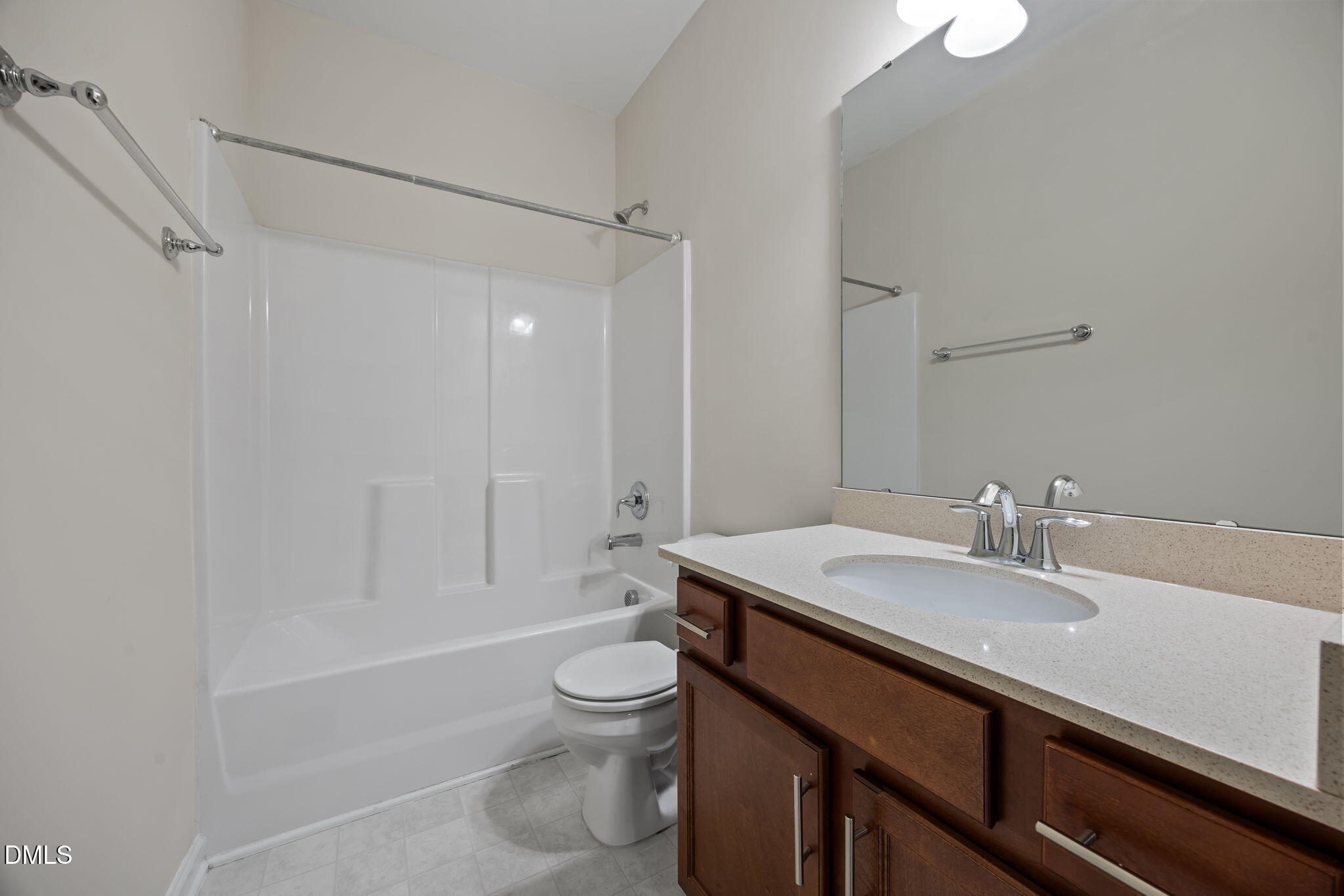 1005 Epiphany Road Morrisville, NC 27560 - Photo 19 of 23 a bathroom with a sink a toilet and shower