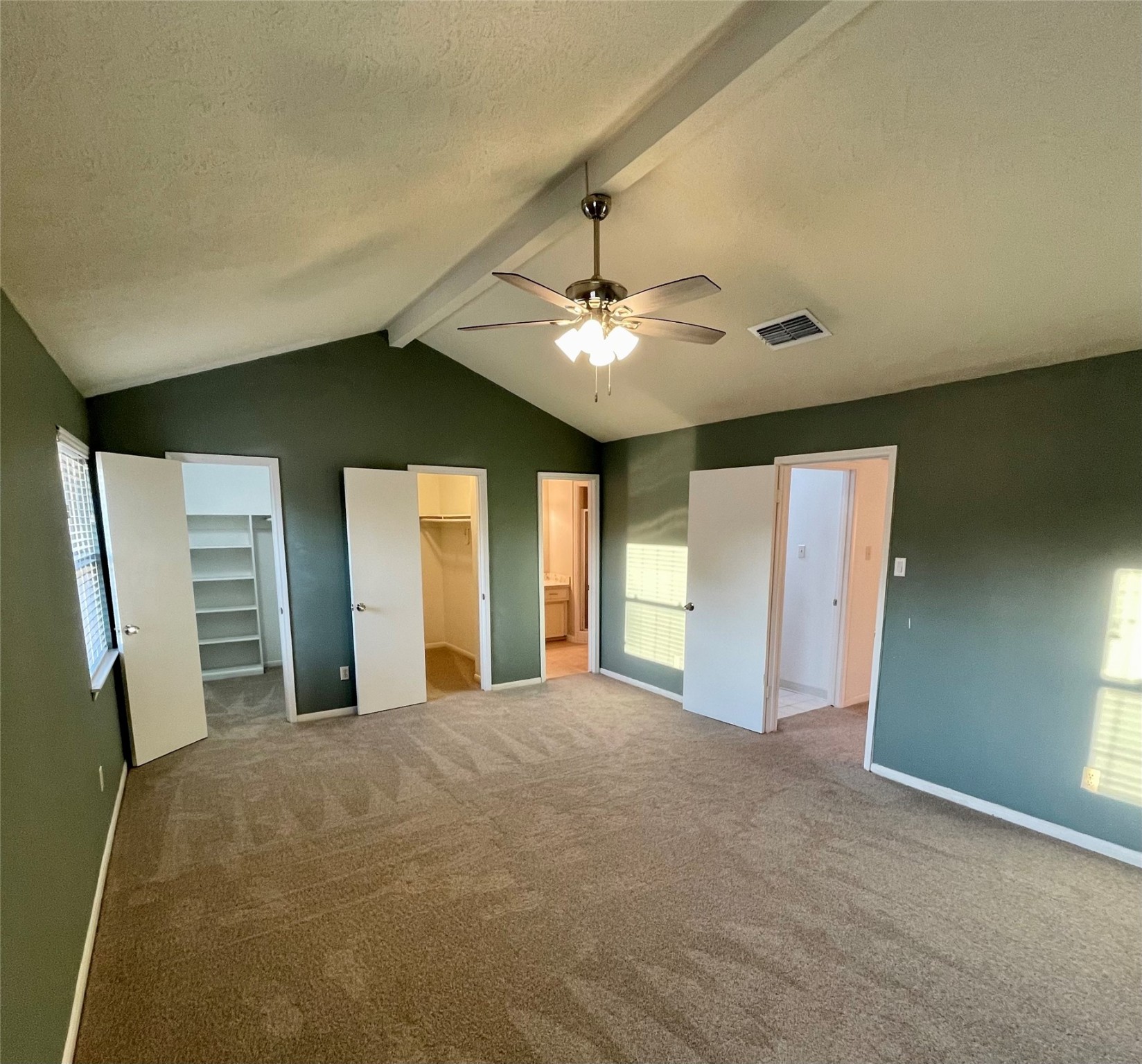 11632 South Kirkwood Road Houston, TX 77477 - Photo 12 of 21 a view of an empty room with a ceiling fan