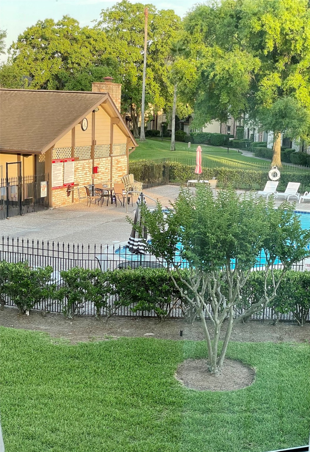 11632 South Kirkwood Road Houston, TX 77477 - Photo 16 of 21 a view of a garden with a lake