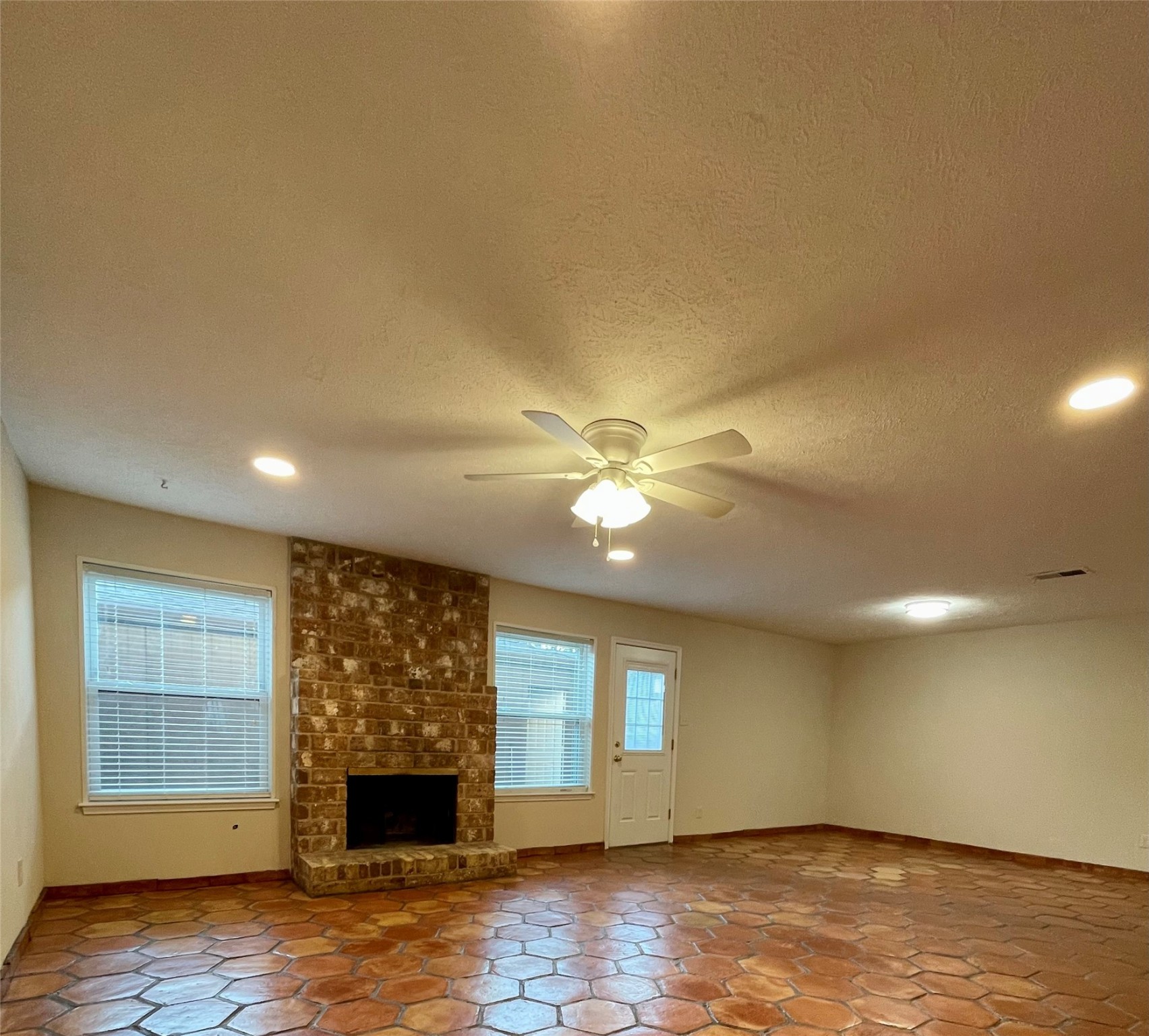 11632 South Kirkwood Road Houston, TX 77477 - Photo 6 of 21 a view of a livingroom with a fireplace