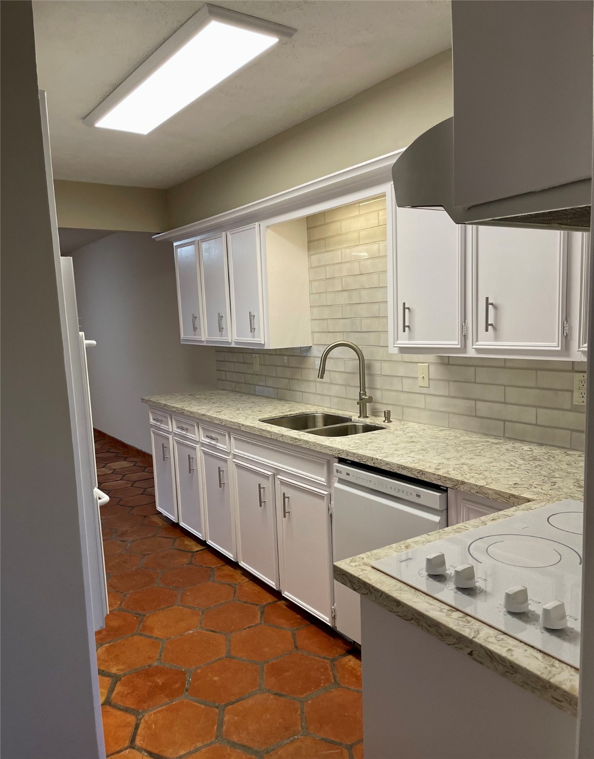 11632 South Kirkwood Road Houston, TX 77477 - Photo 8 of 21 a kitchen with stainless steel appliances granite countertop a sink and a stove