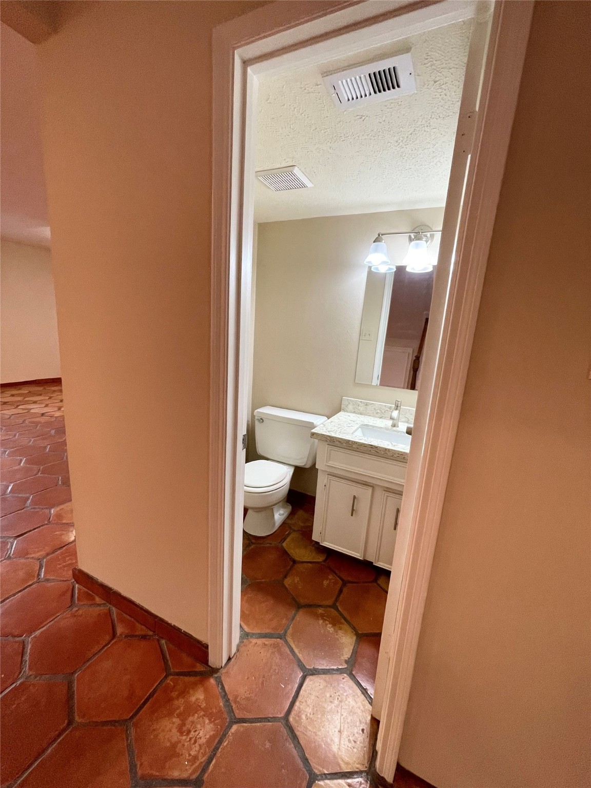 11632 South Kirkwood Road Houston, TX 77477 - Photo 10 of 21 a bathroom with a sink and a mirror