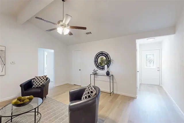 a bedroom with bed and window