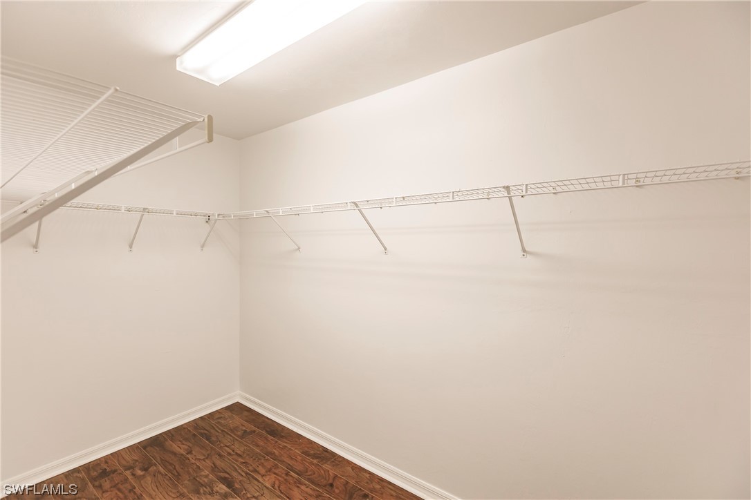 20600 Rivers Ford Estero, FL 33928 - Photo 15 of 28 a view of a room with racks on the wall