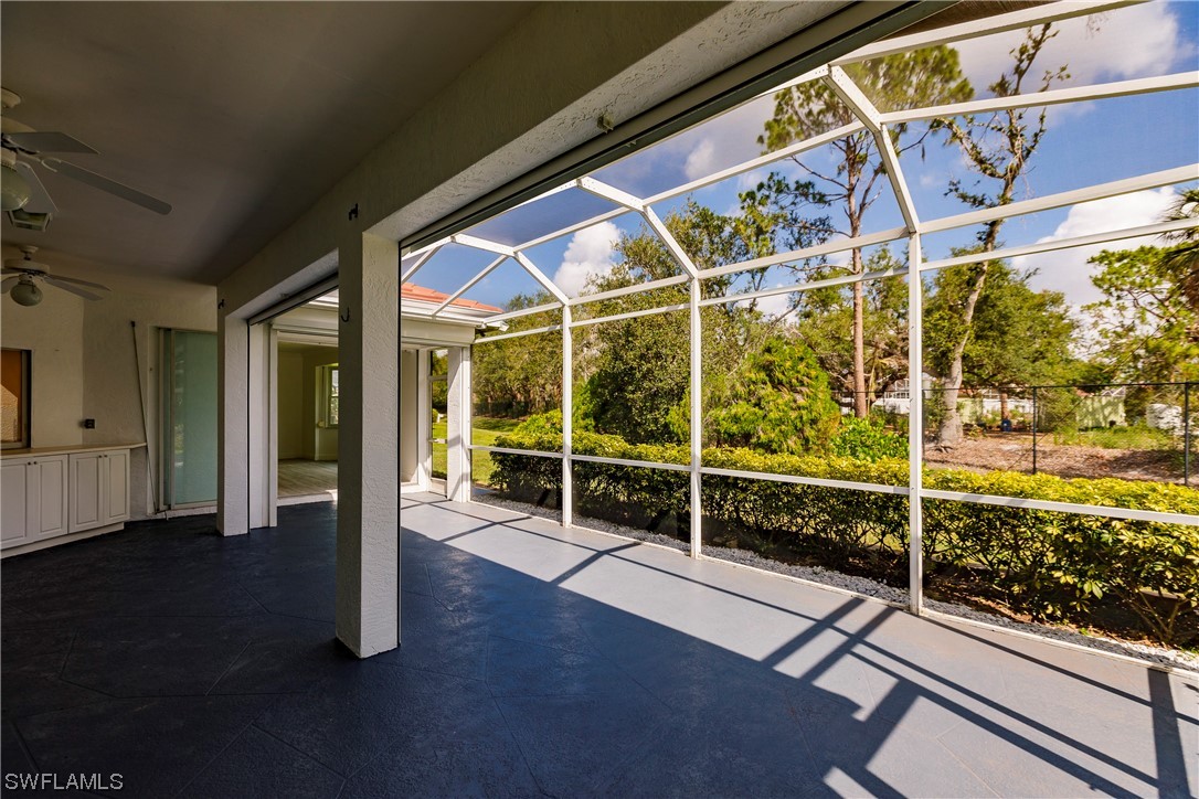 20600 Rivers Ford Estero, FL 33928 - Photo 25 of 28 a view of a porch with wooden floor