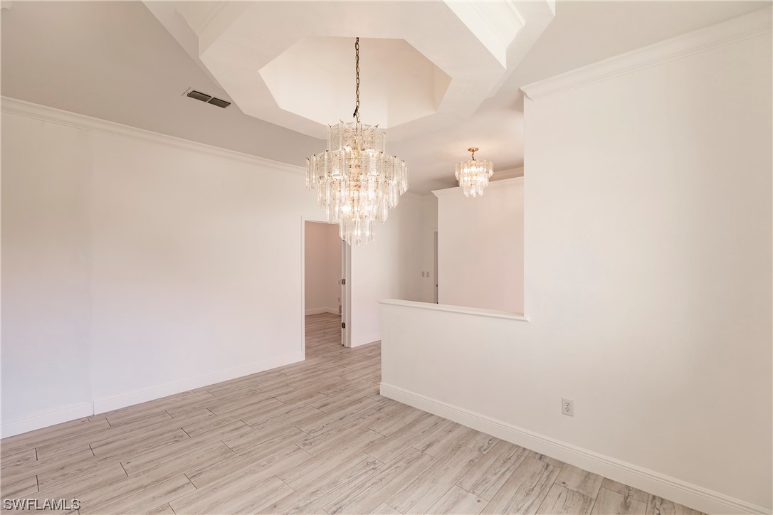 20600 Rivers Ford Estero, FL 33928 - Photo 4 of 28 wooden floor in an empty room