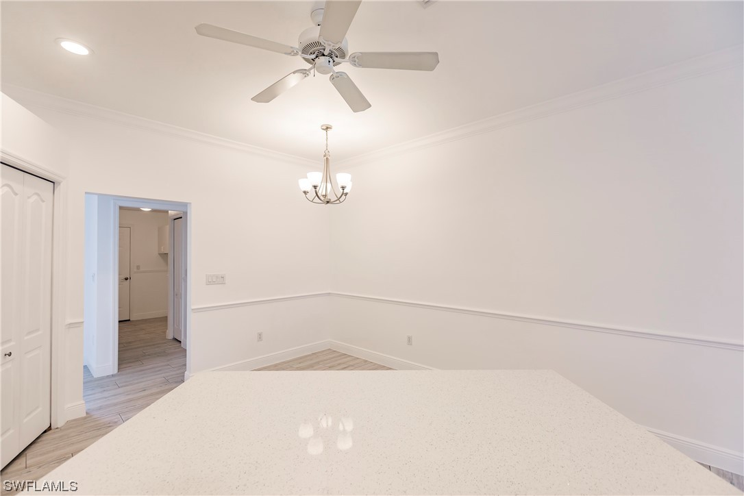 20600 Rivers Ford Estero, FL 33928 - Photo 9 of 28 en empty room with a fan and a ceiling fan