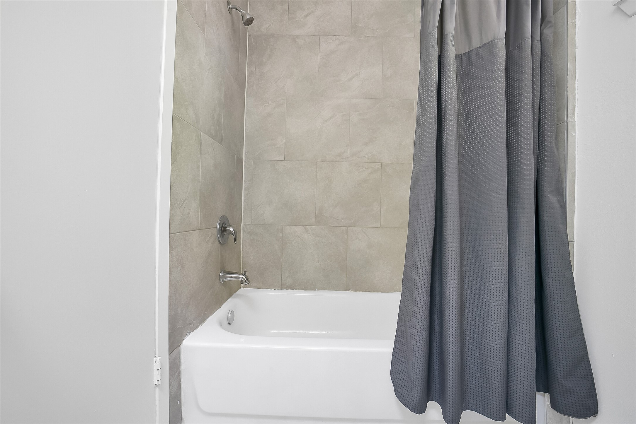 23123 Lestergate Drive Spring, TX 77373 - Photo 15 of 24 a bathroom with a bathtub