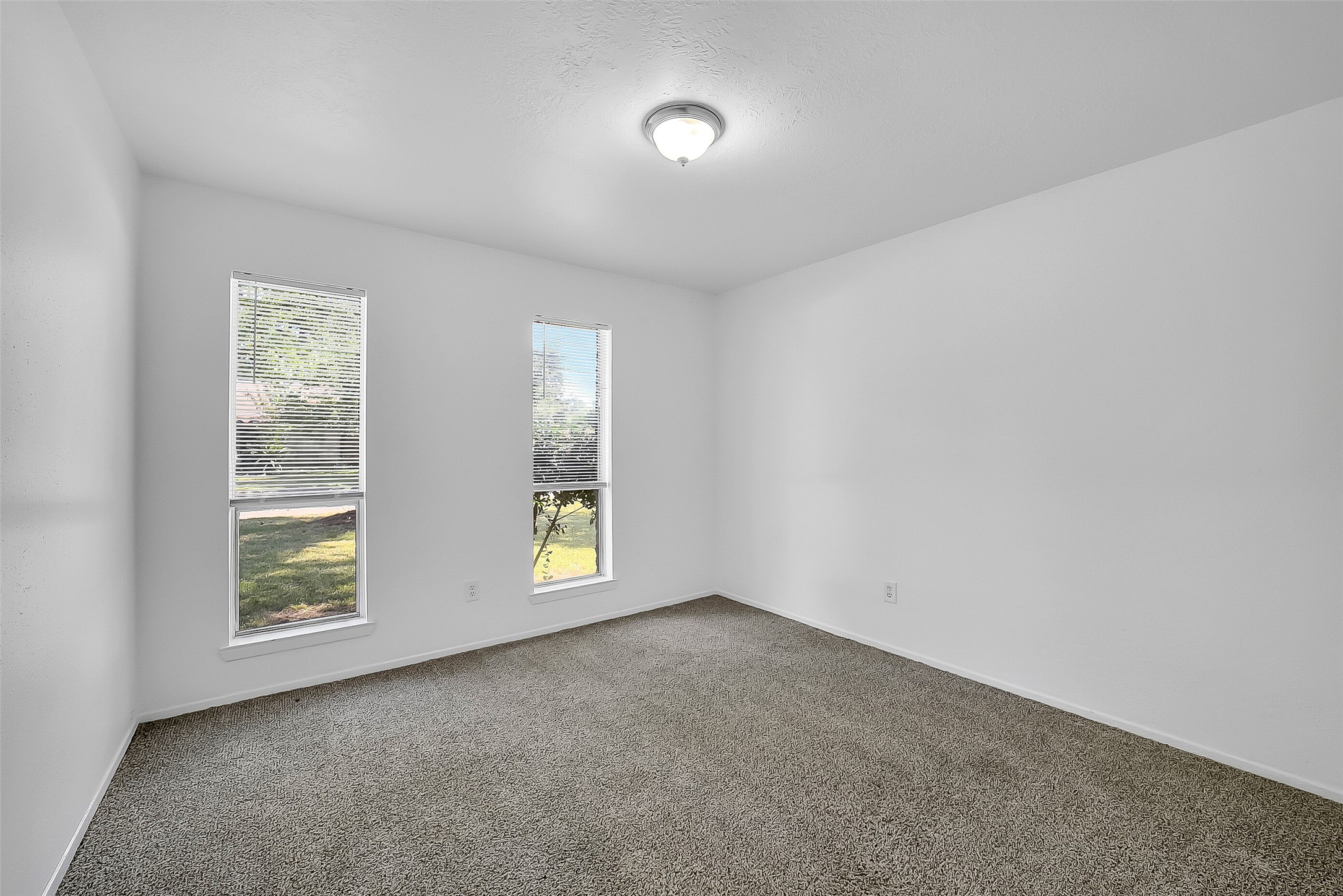 23123 Lestergate Drive Spring, TX 77373 - Photo 19 of 24 an empty room with windows