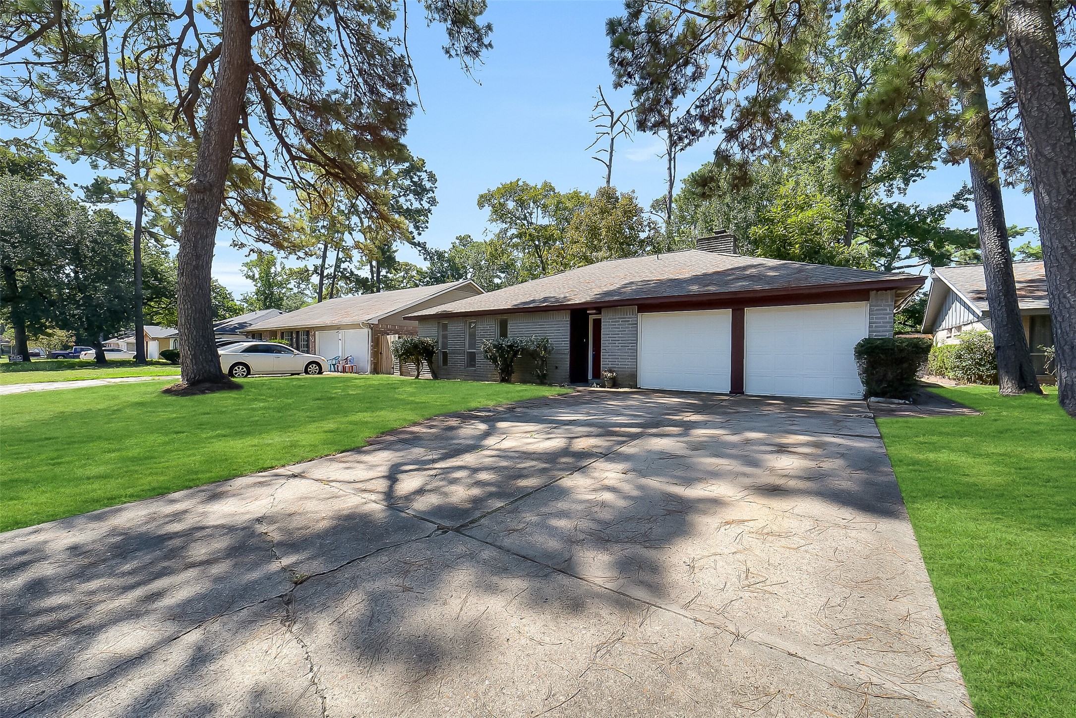 23123 Lestergate Drive Spring, TX 77373 - Photo 3 of 24 a front view of a house with a yard