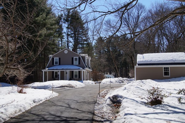 13 Marshbrook Road Billerica, MA 01821 - Photo 1 of 24 a view of a house with snow on the side of the road