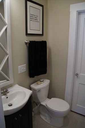 13 Marshbrook Road Billerica, MA 01821 - Photo 12 of 24 a bathroom with a toilet sink and mirror