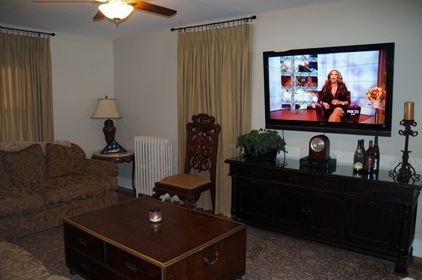 13 Marshbrook Road Billerica, MA 01821 - Photo 14 of 24 a living room with furniture and a flat screen tv