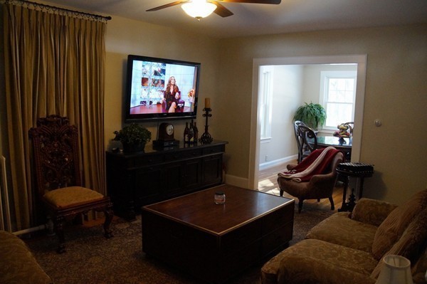 13 Marshbrook Road Billerica, MA 01821 - Photo 15 of 24 a living room with furniture a piano and a flat screen tv