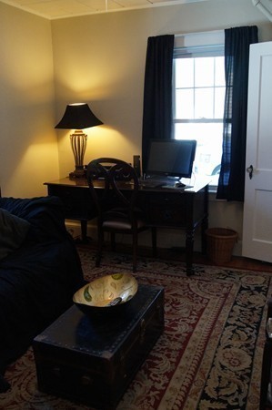 13 Marshbrook Road Billerica, MA 01821 - Photo 16 of 24 a living room with furniture and a lamp