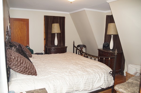 13 Marshbrook Road Billerica, MA 01821 - Photo 20 of 24 a bedroom with a bed and dresser with mirror