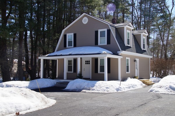13 Marshbrook Road Billerica, MA 01821 - Photo 24 of 24 a view of a house with a yard covered in snow