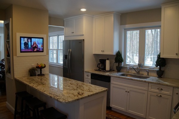 13 Marshbrook Road Billerica, MA 01821 - Photo 5 of 24 a kitchen with refrigerator and cabinets