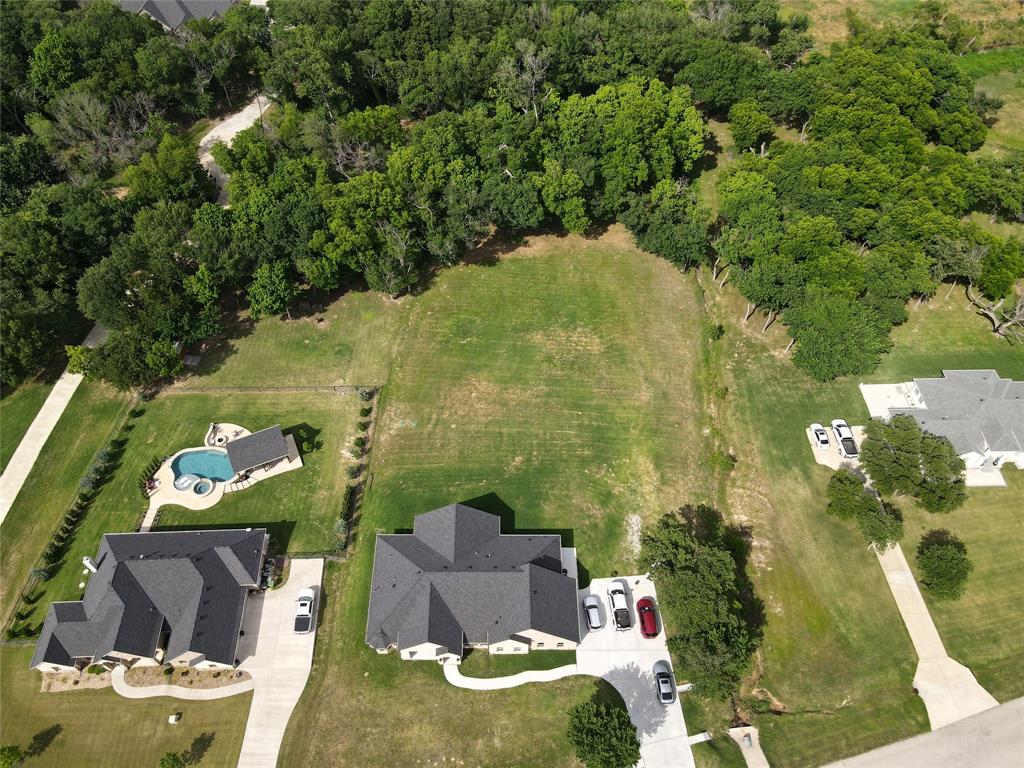 3248 North Cardinal Road Azle, TX 76020 - Photo 2 of 29 Expansive land parcel featuring open grassy areas and mature tree lines