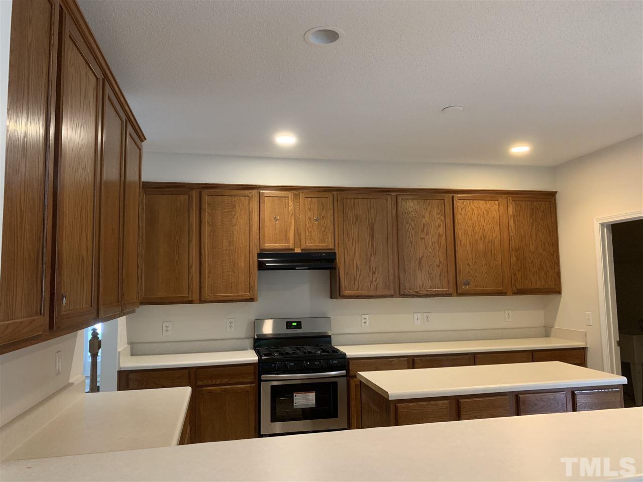 4431 Karlbrook Lane Raleigh, NC 27616 - Photo 14 of 17 large kitchen for lot of Counter Top Space