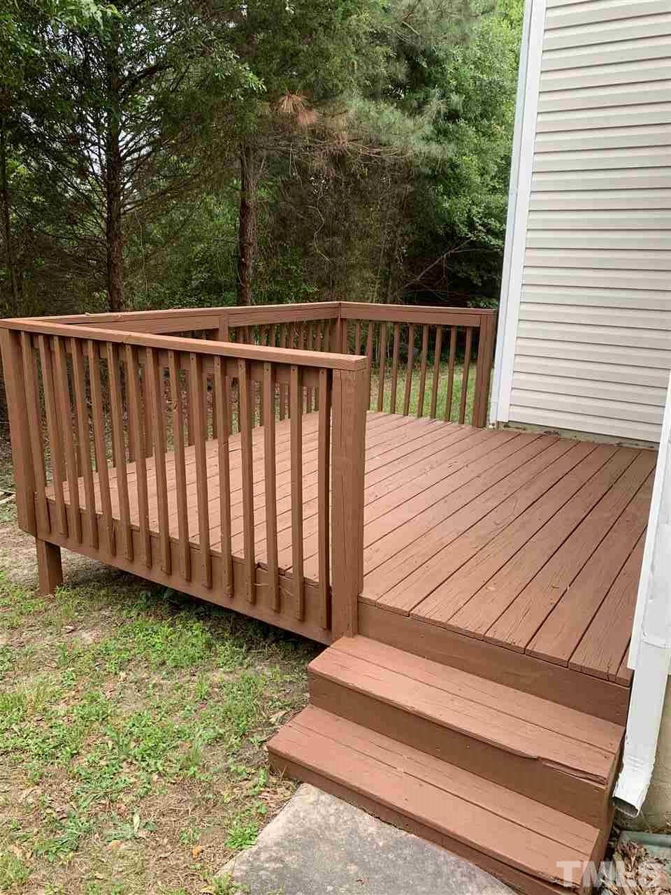 4431 Karlbrook Lane Raleigh, NC 27616 - Photo 4 of 17 Freshly Stained Deck