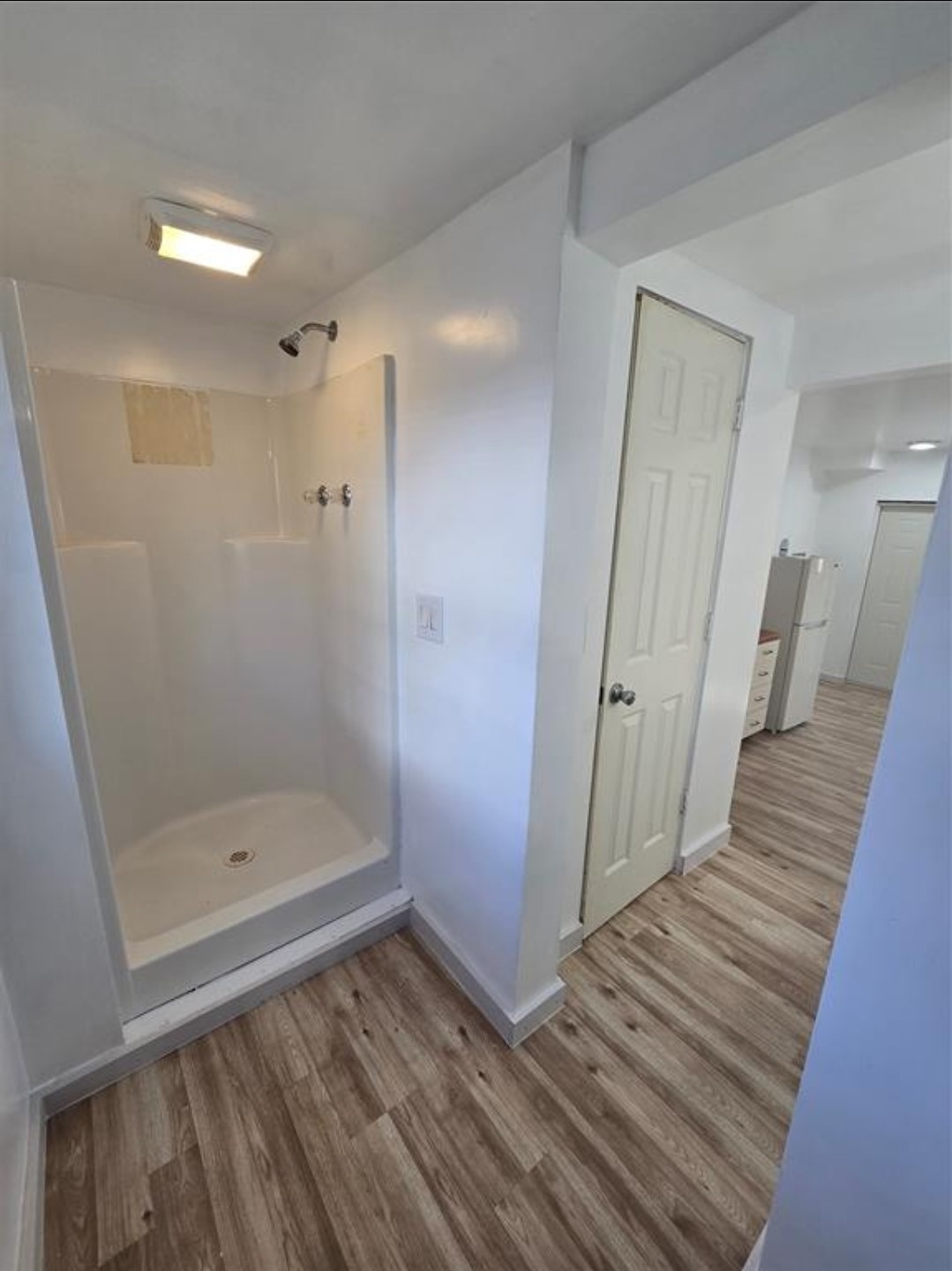 3125 Illinois Street, Unit C Baytown, TX 77520 - Photo 5 of 7 a bathroom with a shower and a tub