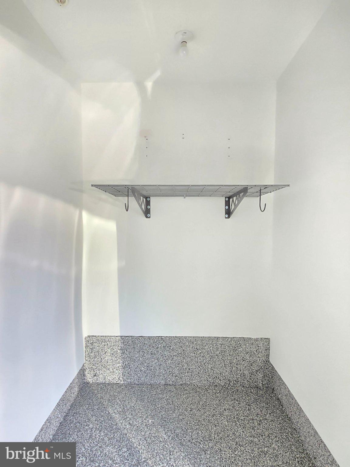 2106 Tysons Ridgeline Road Falls Church, VA 22043 - Photo 27 of 40 Spacious storage area with shelving.