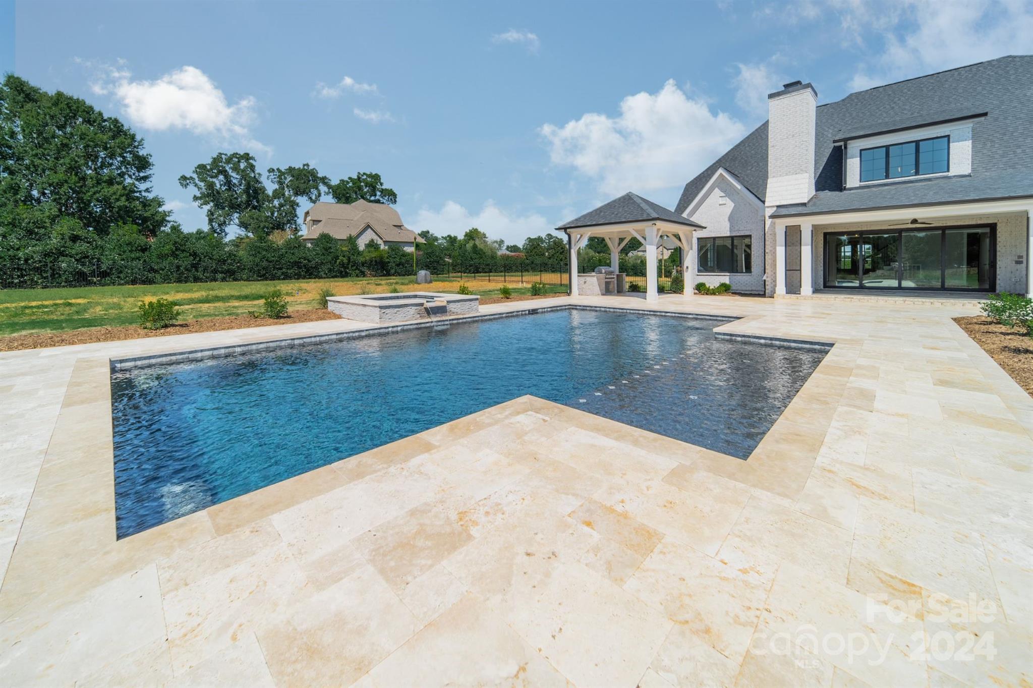 10829 Caroline Acres Road Fort Mill, SC 29707 - Photo 20 of 21 a view of a house with swimming pool and a yard