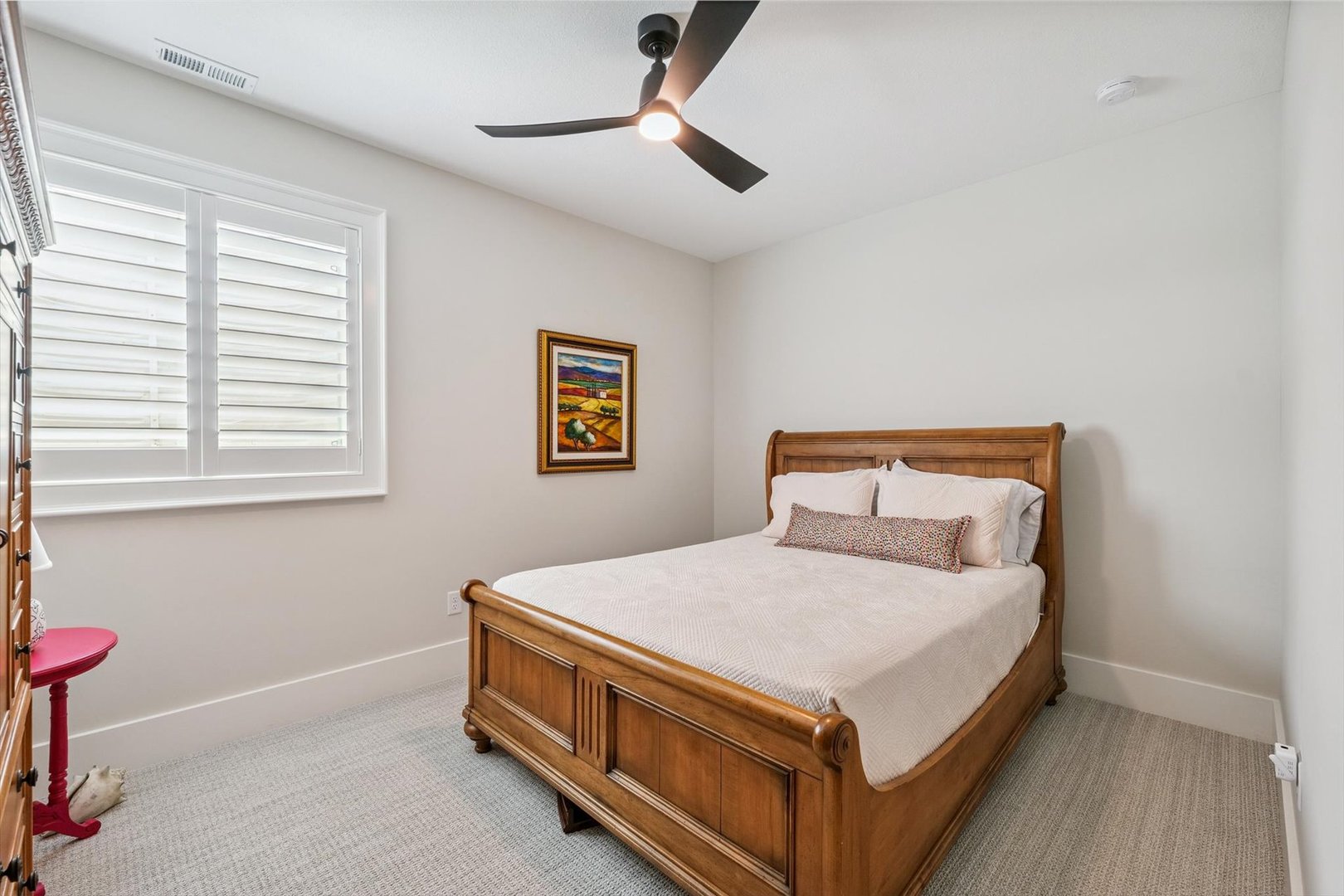 604 Cayman Way Savoy, IL 61874 - Photo 120 of 138 a bedroom with a bed and a chandelier