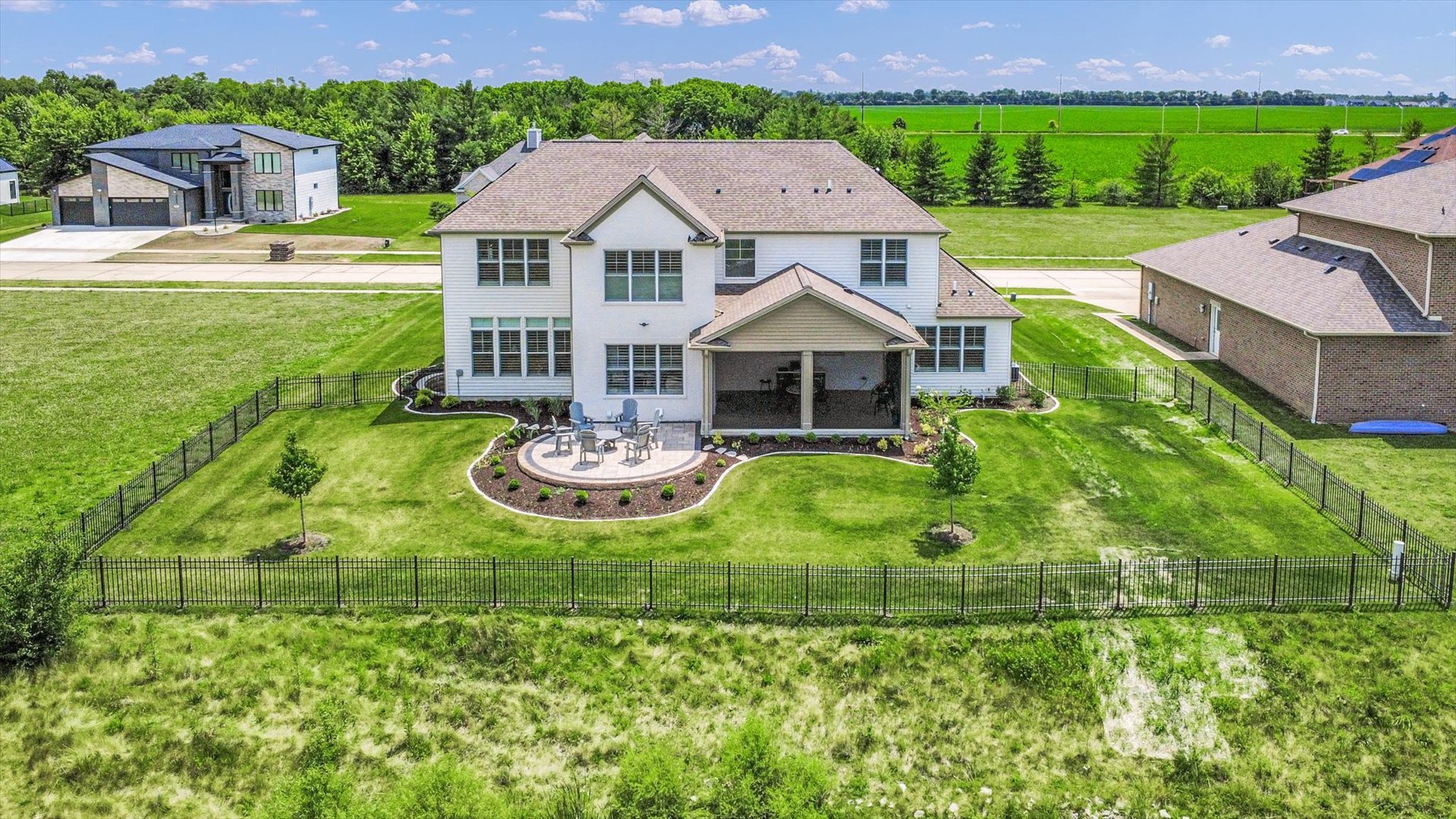 604 Cayman Way Savoy, IL 61874 - Photo 138 of 138 a aerial view of a house with swimming pool garden view and a yard
