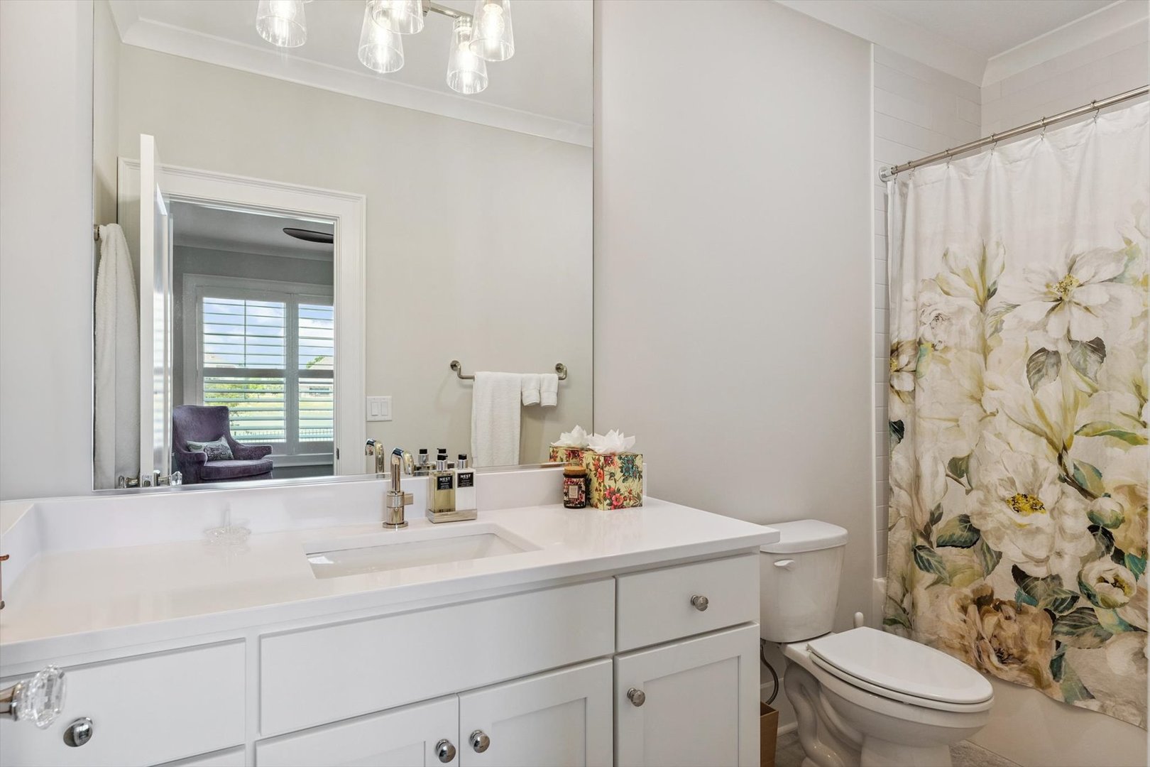 604 Cayman Way Savoy, IL 61874 - Photo 68 of 138 a bathroom with a sink a toilet and shower curtain