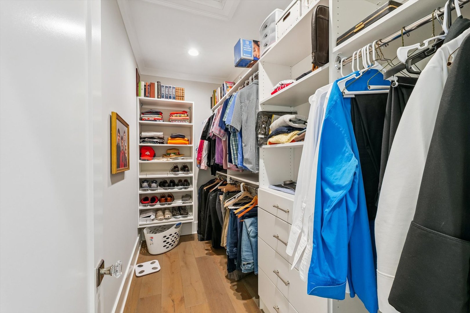 604 Cayman Way Savoy, IL 61874 - Photo 96 of 138 a view of walk in closet with clothes and shoes
