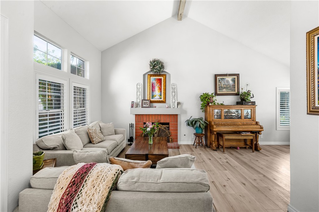 19465 Kinnow Lane Riverside, CA 92508 - Photo 6 of 61 a living room with furniture and a fireplace