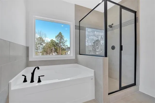 a white toilet sitting in a bathroom