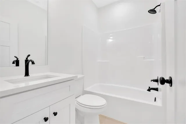 a view of a hallway with closet area