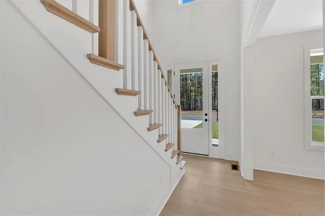a view of a hallway with staircase
