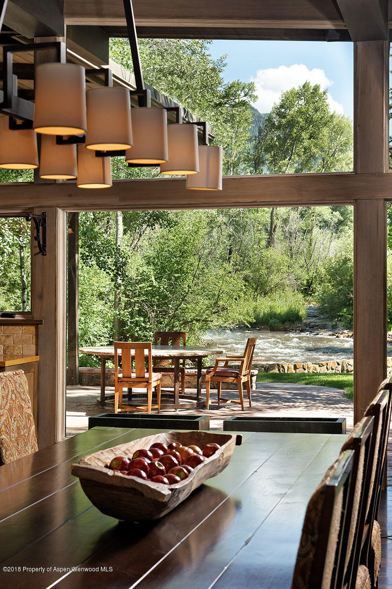 1055 Stage Road Aspen, CO 81611 - Photo 15 of 32 a room with furniture and a large window