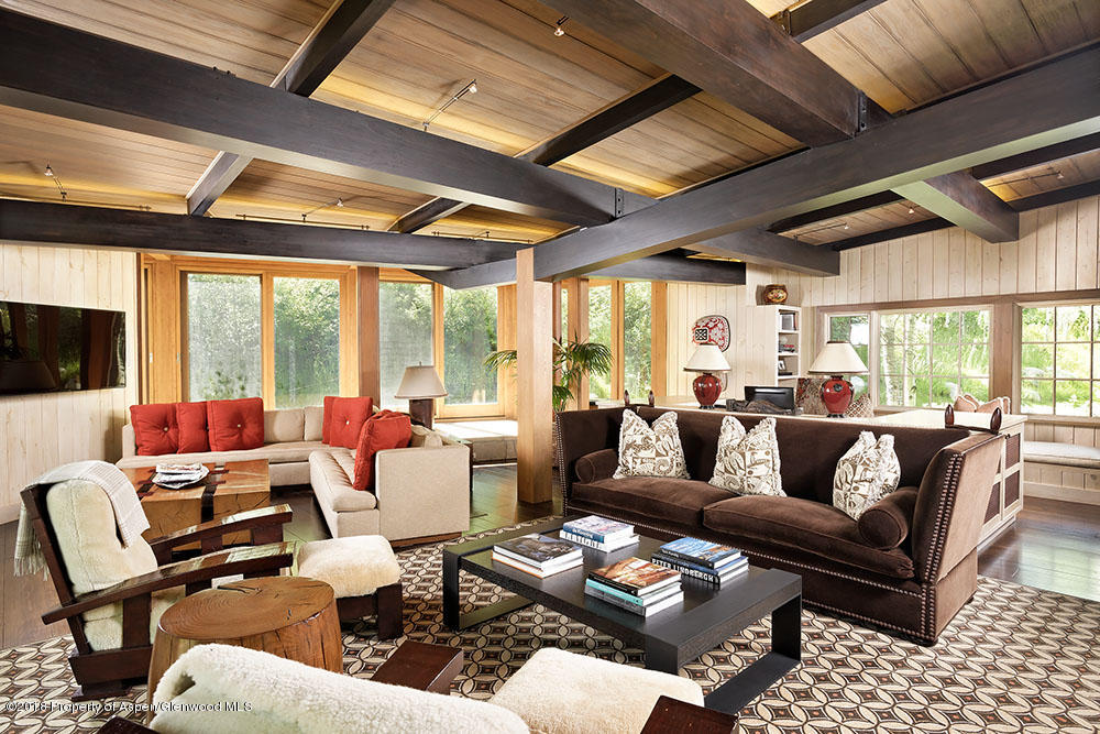 1055 Stage Road Aspen, CO 81611 - Photo 18 of 32 a living room with furniture and a large window