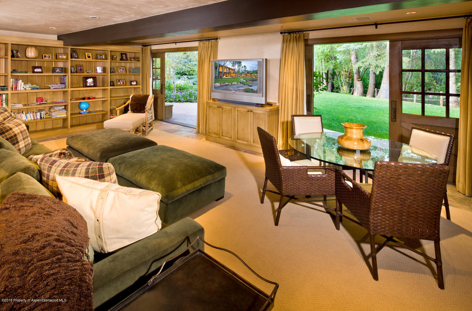 1055 Stage Road Aspen, CO 81611 - Photo 29 of 32 a living room with furniture and a large window
