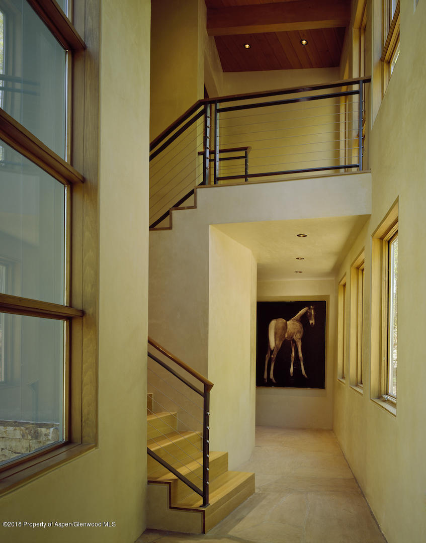 1055 Stage Road Aspen, CO 81611 - Photo 30 of 32 a view of a room with door and furniture