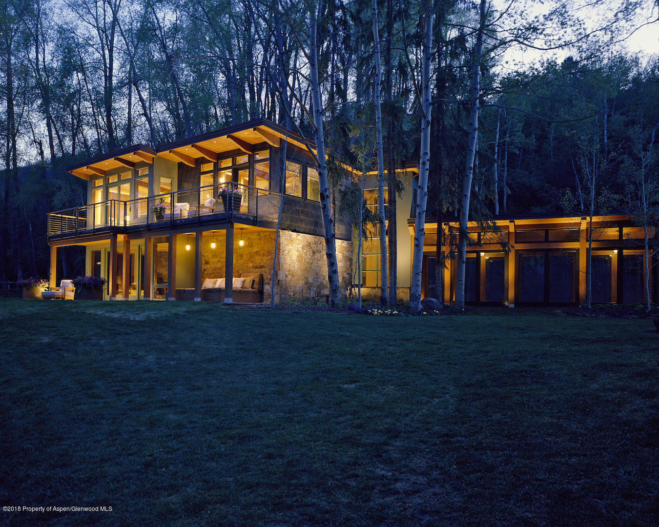 1055 Stage Road Aspen, CO 81611 - Photo 7 of 32 a backyard of a house with lots of green space